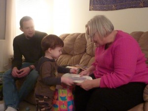 Elias showing Nana the plate he made for her.