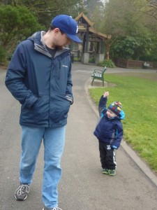 After the elephants, Elias wanted to walk instead of ride. Here he is telling his Daddy how tall the elephants were.