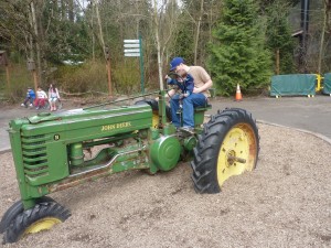 Elias and Daddy exploring the tractor