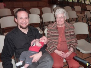 Simon meeting his great grandma for the first time. He is her 13th great grandchild