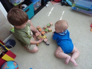 Elias trying to decide what to do with his new playmate