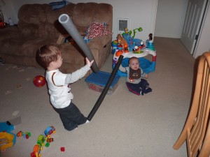 Swords! Simon got in on the sword action. Uncle Scott left these over at our house, and Elias has taken maximum advantage of that fact. He mostly likes to play swords with Nathan or me, but he has played with Simon a few times. 