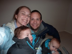 My attempt at our first family picture in the new house. It is real life...so it's better than everyone smiling and looking, right?