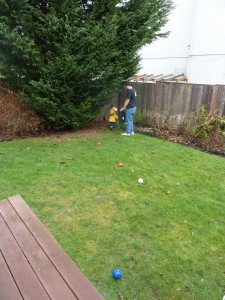 Elias' first time playing "bat and ball" in his own backyard!