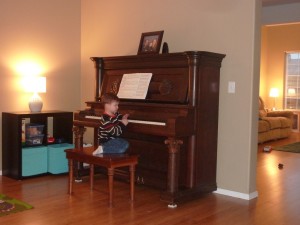 Elias playing the piano.